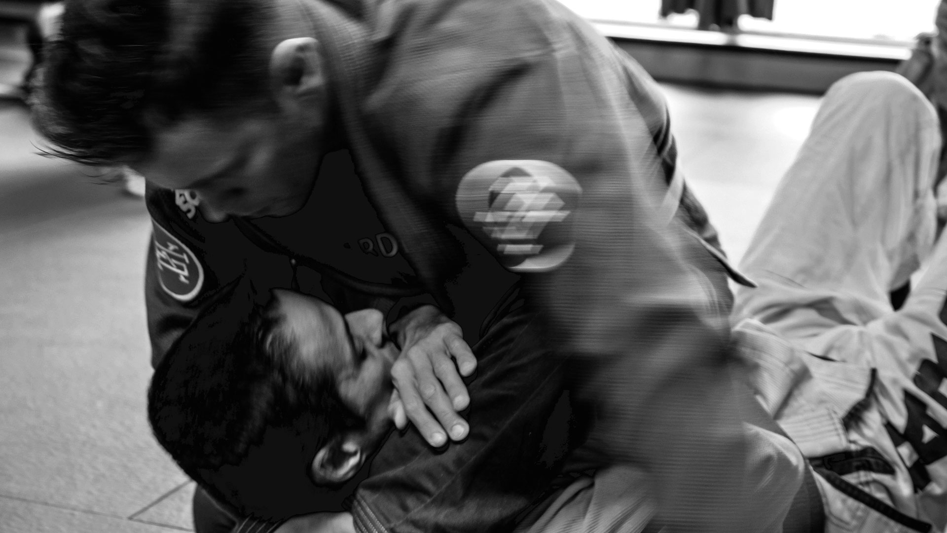 a student landing a BJJ submission